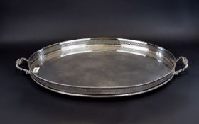 Large Silver Plated Serving/Drinks Tray Oval vintage tray with ornate handles and reticulated edge.