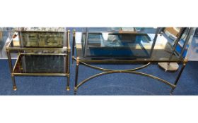 Two Contemporary Glass Tables Comprising a rectangular coffee table and small occasional/side table.