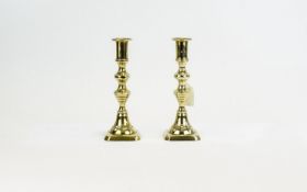 Pair of Brass Candlesticks, 8.5 inches in height.