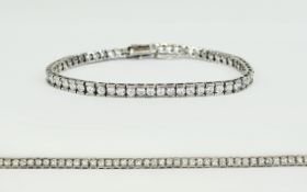 Faux Diamond Tennis Bracelet, round cut, clear faux diamonds, individually channel set in silver,
