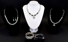 A Collection Of Bead Crystal And Silver