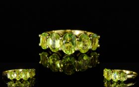 Peridot Five Stone Ring, a 1.25ct centra