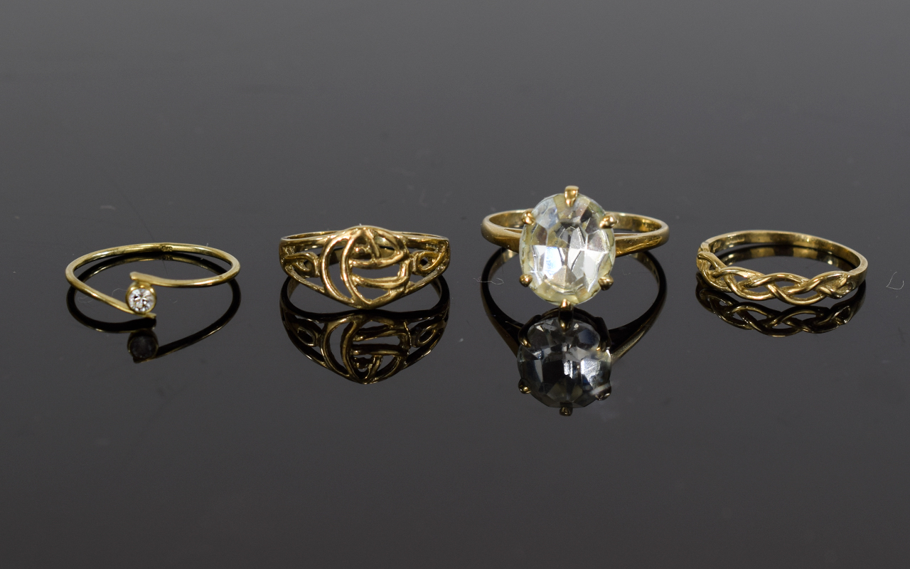 A Collection of 4 ( Four ) 9ct Gold Dress Rings. All Fully Hallmarked for 375 - 9ct Gold - Please