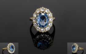 1920's Diamond and Aquamarine Cluster Ring. Flower head Setting, The Central Oval Aquamarine of Good