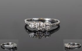 Platinum Diamond Ring, Set With Three Round Cut Diamonds, Claw Setting, Estimated Diamond Weight .