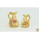 Royal Worcester Blush Ivory Handpainted Jugs Two in total decorated and painted in polychrome