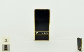 Pierce Cardin Black and Gold Slim line Lighter. 3 Inches High. Good Overall Condition.