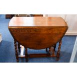 Aged Oak Pembroke Table Drop leaf table with barley twist legs and aged patina.