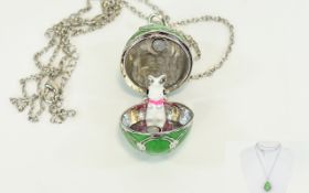 Green Enamelled Egg and Rabbit Charm Pendant, the egg pendant, enamelled in apple green and set with