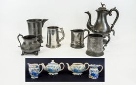 Collection of Pewter Items including tankards, one with a handle in the form of a fox,