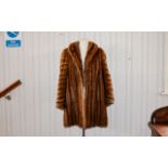 Mink Coat Heavy weight vintage mink coat in golden tone with chevron detail to arms.