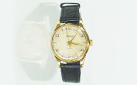 A Gents 9 Carat Gold Wrist Watch Vintage watch with original black/brown leather strap, white