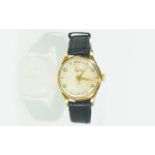 A Gents 9 Carat Gold Wrist Watch Vintage watch with original black/brown leather strap, white