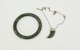 Jade Bangle. Together with a Silver Mounted Jade Pendant In The Form of a Horn with An Attached