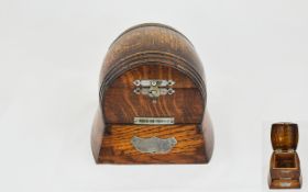 1920's Oak Key-wind Musical Box In The Form of a Large Beer Barrel and Stand. Reg No 729416.