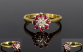 18ct Gold Ruby and Diamond Set Ladies Dress Ring. Flower head Setting, The Central Diamonds