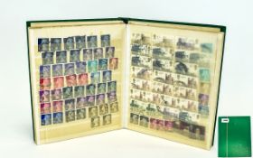 A5 16 page stamp stock book filled with mostly Gb and german stamps.