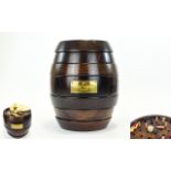 Remy Martin Oak Barrel Collectors Games Compendium Barrel shaped dark oak games collection in seven