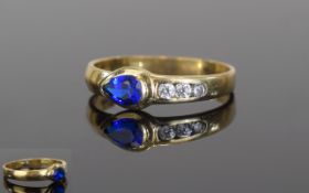 14ct Yellow Gold Set Sapphire and Diamond Dress Ring. Marked 585 14ct. The Sapphire and Diamond of
