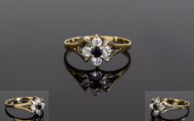Ladies 9ct Gold Set Sapphire and Diamond Dress Ring. The Central Sapphire Surrounded by 4