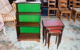 Display Shelves And Nest Of Tables Three shelf display unit with green baize backing.