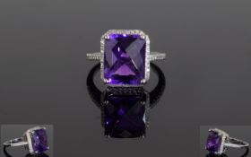 14ct White Gold Amethyst & Diamond Ring, Set With An Emerald Cut Purple Amethyst (Estimated Weight