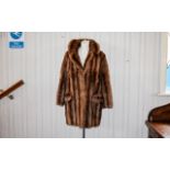 Vintage Mink Coat Mid length plush golden brown mink coat with front patch pockets,