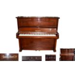 Russel and Russel Ltd Mahogany Upright Piano , Mahogany framed and ebony and ivory keys.