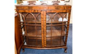 Mahogany Display Cabinet Glazed two door cabinet with three internal shelves and claw and ball feet.