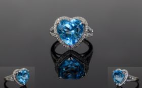 14ct White Gold Diamond & Topaz Ring, Central Heart Shaped Blue Topaz (Approx 6.75cts) Surrounded By