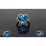 14ct White Gold Diamond & Topaz Ring, Central Heart Shaped Blue Topaz (Approx 6.75cts) Surrounded By