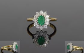 18ct Gold Emerald And Diamond Ring, Set With A Central Oval Emerald Surrounded By Round Modern