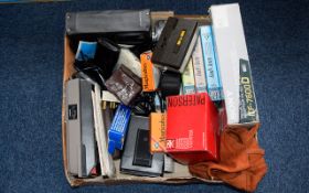 A Mixed Collection Of VHS And Camera Related Items Includes Paterson 66 viewer, Dads army videos,