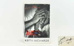 The Rolling Stones Autograph in book - Keith Richards