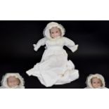 Vintage Bisque Three Faced Infant Doll Rare and unusual doll with cloth hand stitched body and