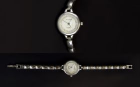 A Ladies Jane Shilton Wrist Watch With faux mother of pearl dial