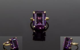 A Vintage Period 9ct Gold Large Amethyst Set Dress Ring, The Step-cut Amethyst of Excellent