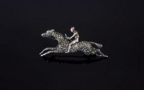 Victorian Period Silver Brooch In The Form of a Racehorse and Jockey at Full Gallop. Set with