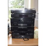 Technics Stereo HiFi System Black stereo with cassette deck, turntable, and super bass drive.