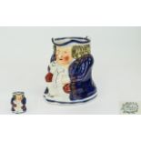 Staffordshire 'Foaming Ale' Toby Jug, c1840, typical stout jolly figure in cobalt blue coat and