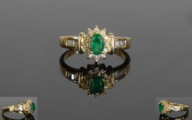 14ct Yellow Gold Emerald and Diamond Cluster Ring, with a Flower head Setting. 4.2 grams. The