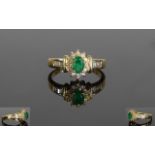 14ct Yellow Gold Emerald and Diamond Cluster Ring, with a Flower head Setting. 4.2 grams. The