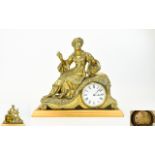 Early 20th Century Persian Influence Figural Eight Day Brass Clock Features a white porcelain dial