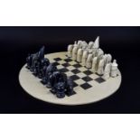 Stone Effect Chess Set with Oval Board and Traditional Chess Pieces.