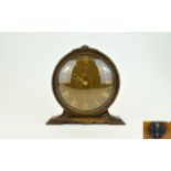 Smiths 1930's Circular Carved Oak Mantle Clock. 9.5 Inches High & 9.5 Inches Wide. In Working Order.