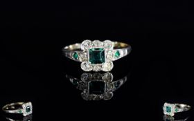 A Ladies 9ct Gold Emerald And Diamond Cluster Ring Fully hallmarked for 9ct, the central emerald