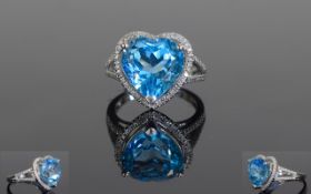 14ct White Gold Diamond Topaz Ring, Set With A Heart Shaped Topaz, (Approx 6.75 cts) Surrounded By
