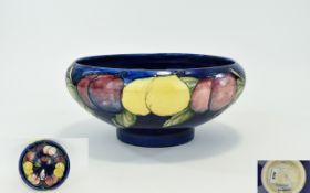 William Moorcroft Hand Painted and Signed Inverted Footed Bowl ' Wisteria ' Plums Design on Blue