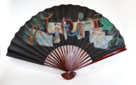 Oriental Decorative Fan Large fan, designed for decorative purposes, fashioned from black