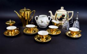 A Small Collection Of Ceramics Comprising gilt coloured part tea set, good luck black cat teapot,